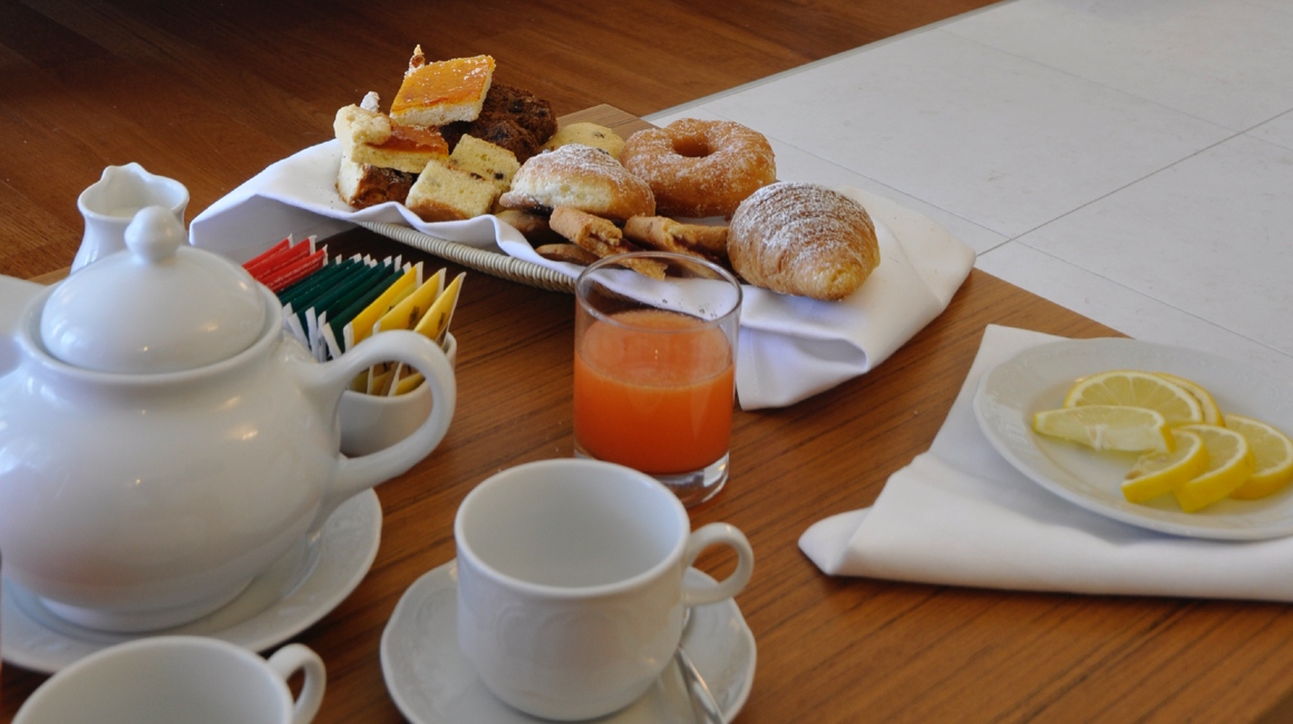 colazione in camera da letto presso hotel del Faro